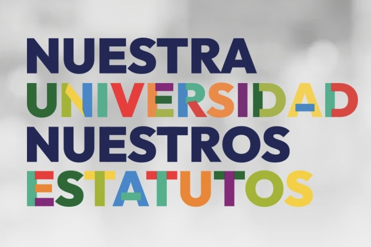 Se lee lema oficial de la campaña "nuestra universidad, nuestros estatutos" en letras de colores.